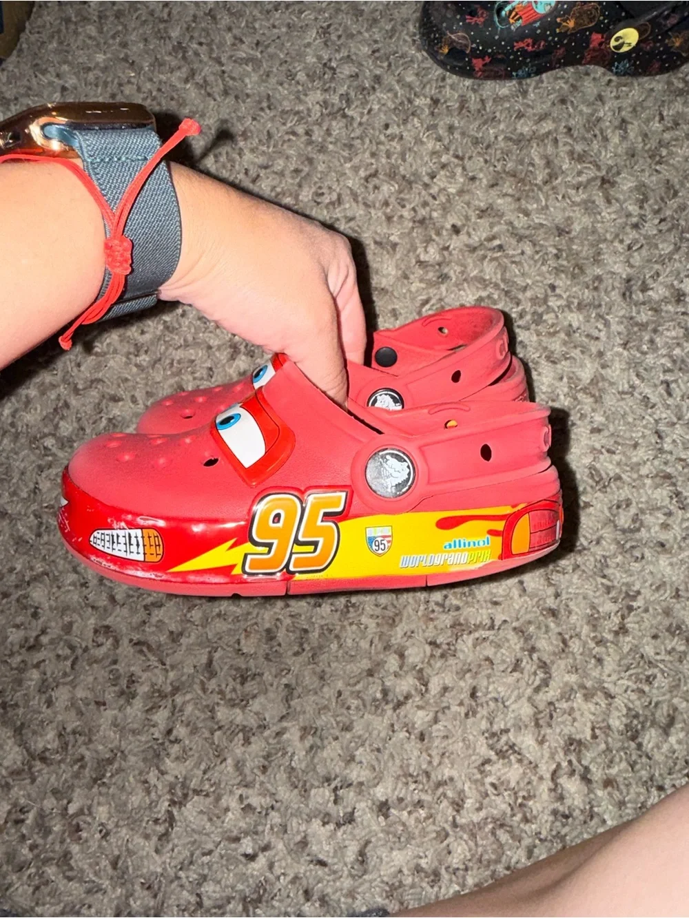 CROCS Red Kids Slip-On Clogs with Playful Eye Graphic